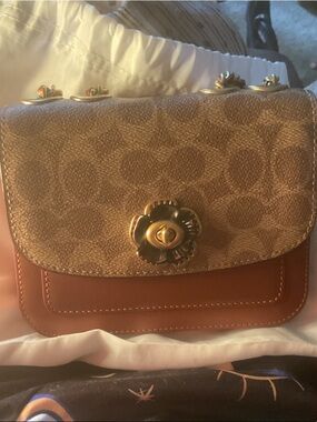 Coach Signature Floral Turnlock Crossbody in Brown and Tan